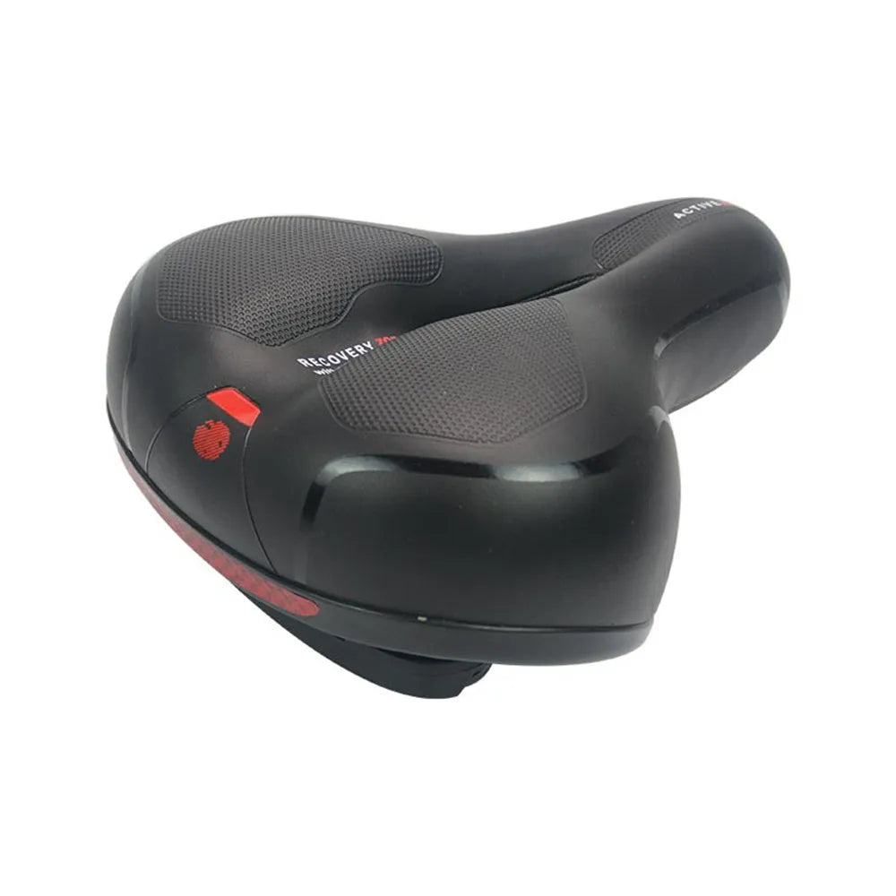 Bicycle saddle cushion with silicone padding and waterproof cover alongside wrench and patch kit
