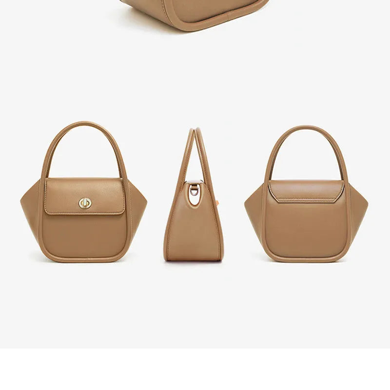 Wing-shaped women's leather handbag with latch closure and cross-body strap in available colours.