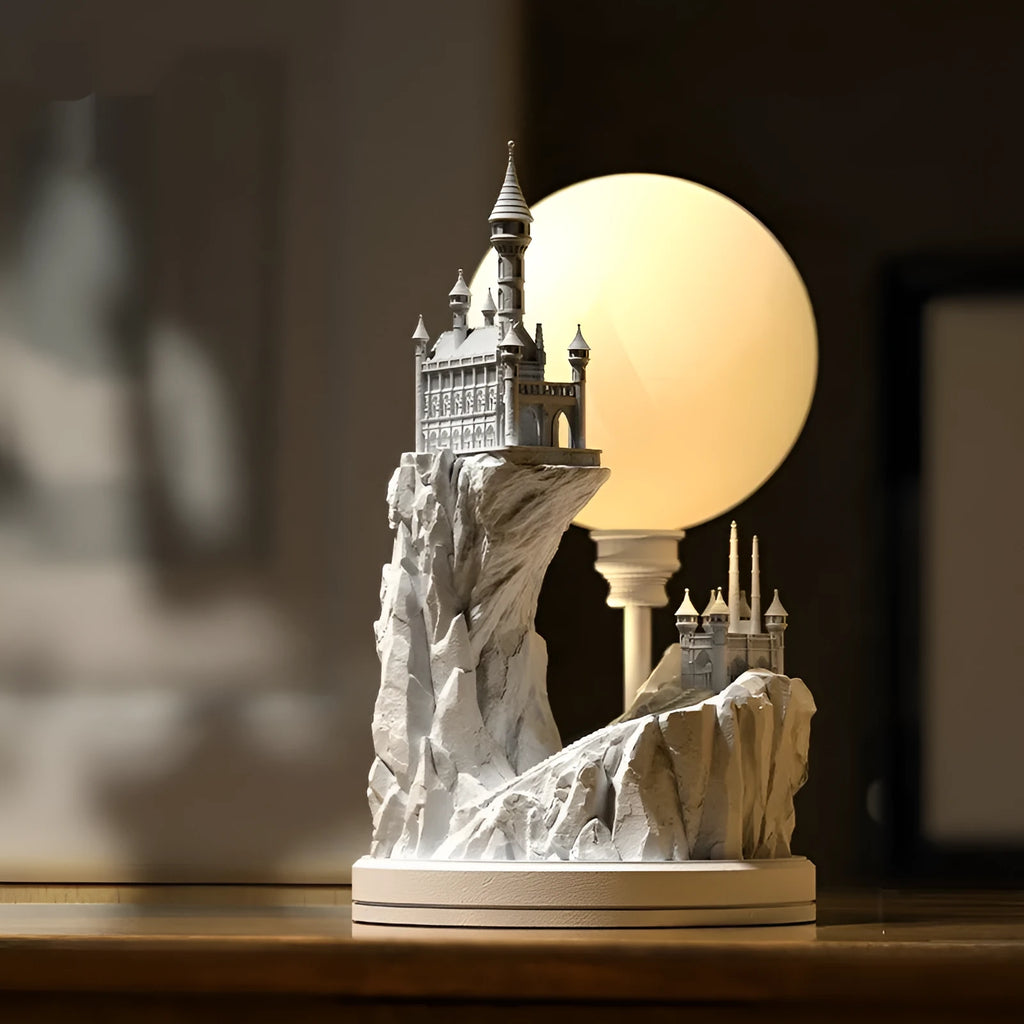 White composite gypsum table lamp with cable and switch on a surface.