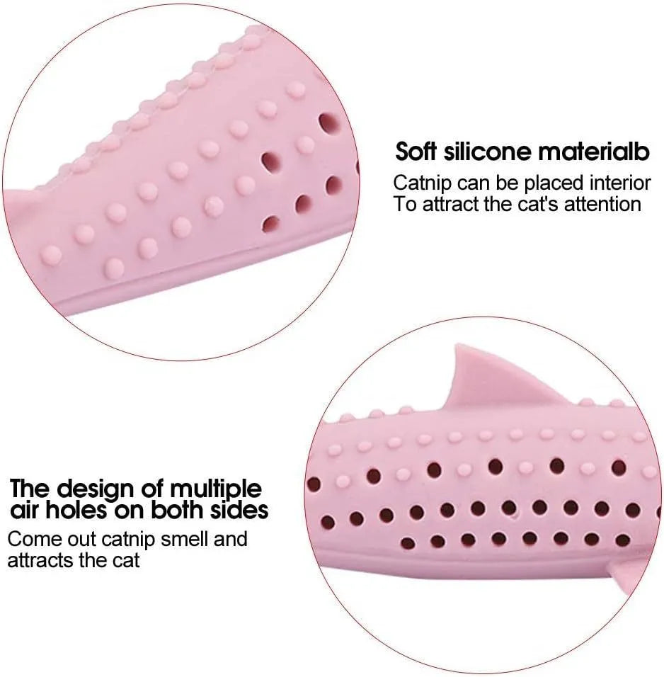 Green silicone fish-shaped cat chew toy with removable design showing breathable side holes