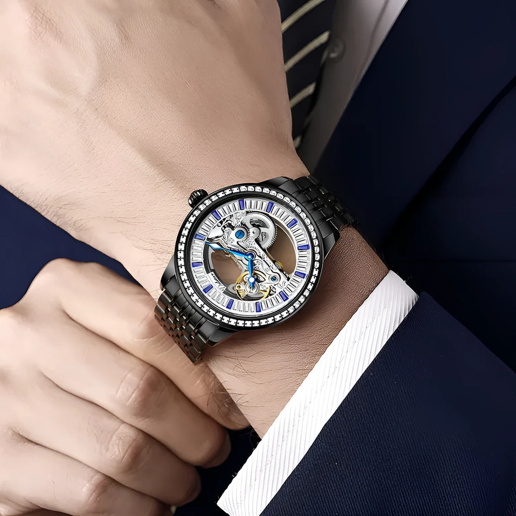 Men's luxury zircon mechanical watch on leather strap showing onion crown and transparent case back.