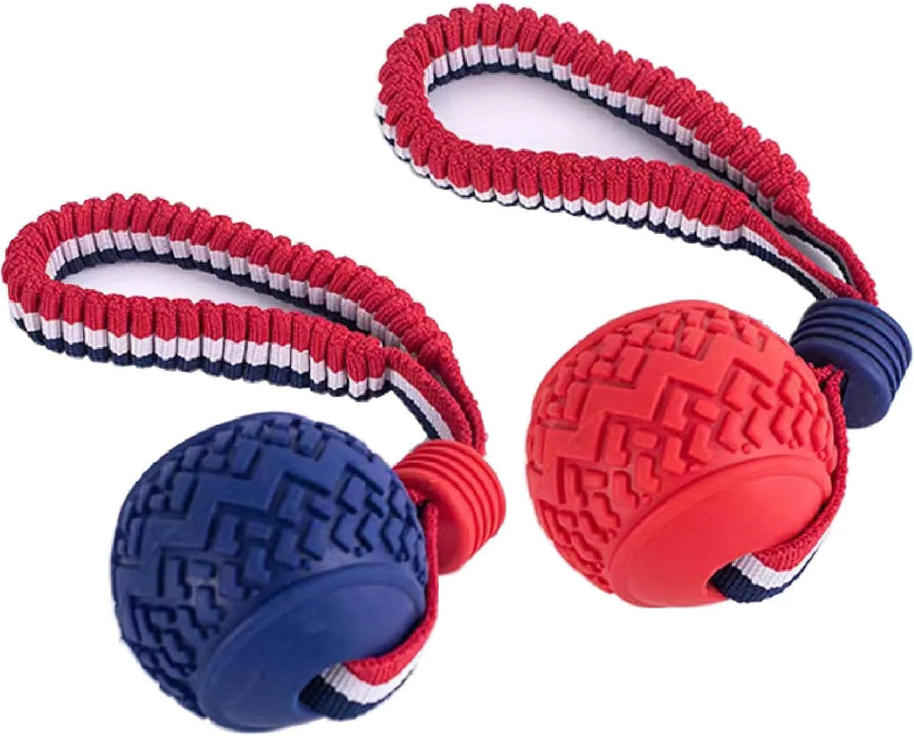 Blue dog ball with attached rope toy for small medium dogs showing textured surface