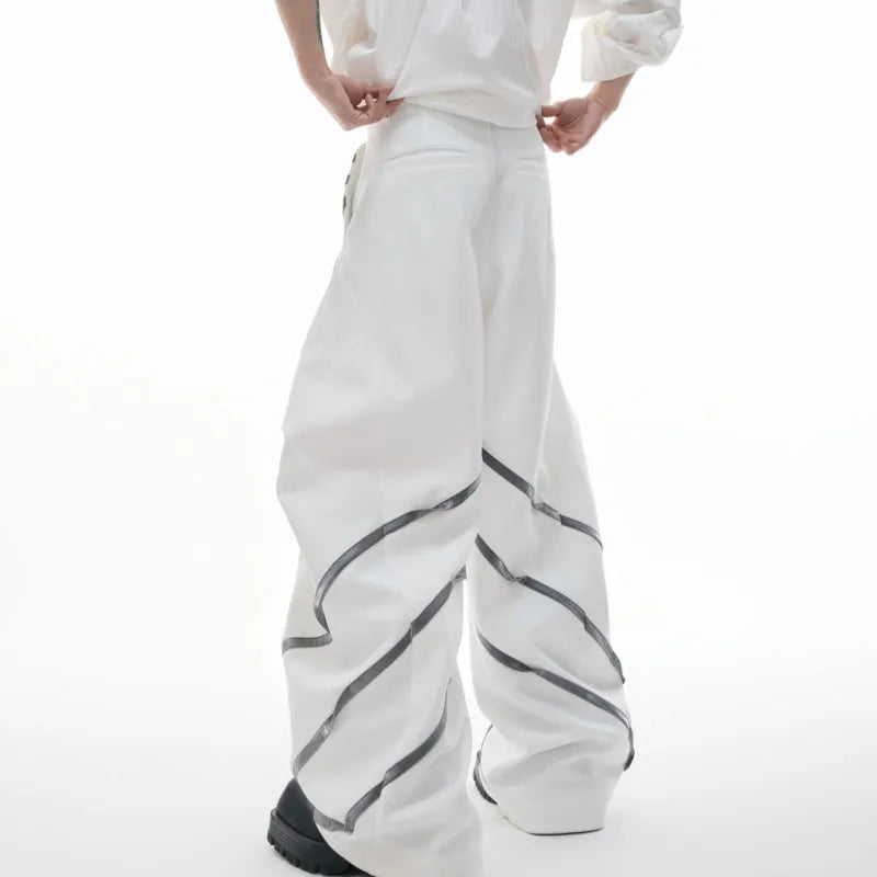 Men's polyester trousers with three-dimensional cutting, metal striped rivets, and pleated design
