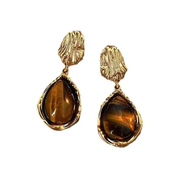 Handmade geometric alloy earrings with tassels in three styles: round, irregular, and teardrop