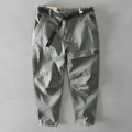 Men's casual Japanese overalls in cotton with elastic fabric, shown in khaki, black, light grey, and army green colours