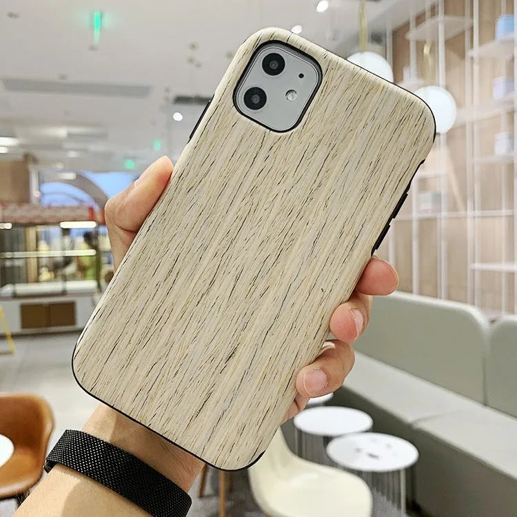 Wooden iPhone case showing natural bamboo grain texture on slim back cover design