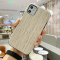 Wooden iPhone case showing natural bamboo grain texture on slim back cover design