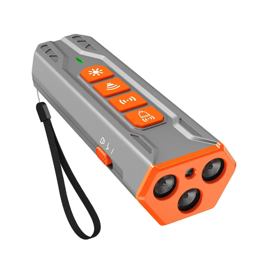 Three-head ultrasonic dog trainer in black and orange colour on a grey background.