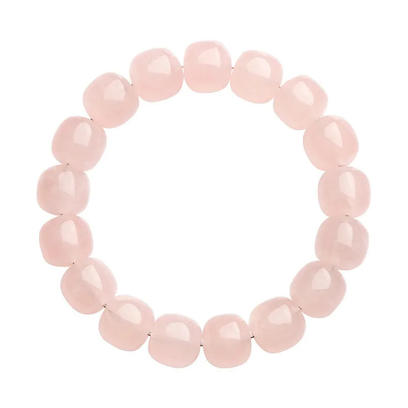 Pink crystal barrel bead bracelet with geometric design and 11-12mm beads