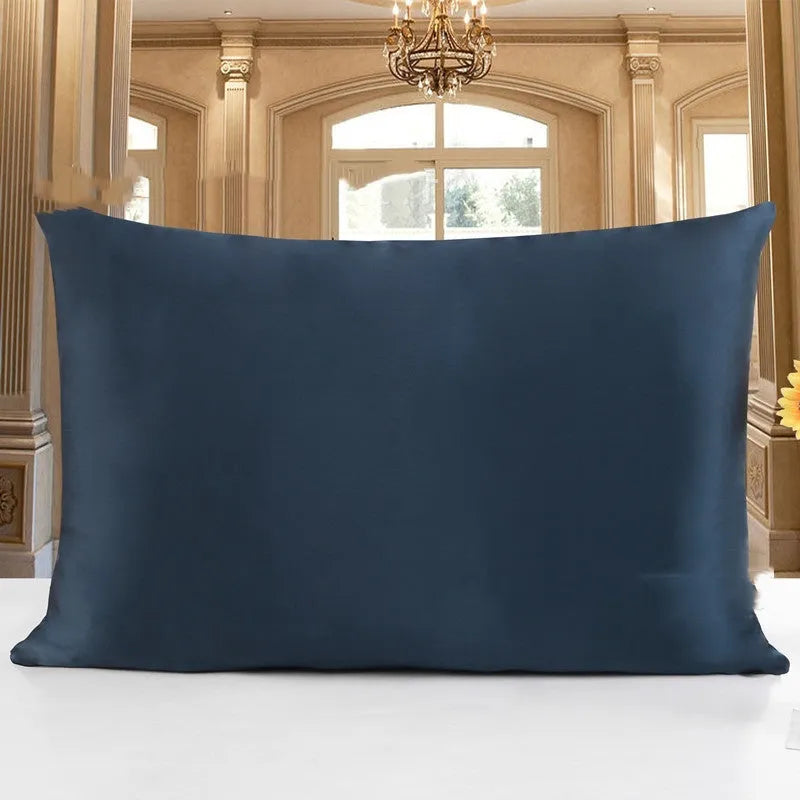 19 M double-sided silk pillowcase in apricot colour, showing envelope closure and smooth fabric texture.