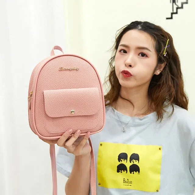 Women's small PU shoulder backpack purse in multiple colours with zipper closure