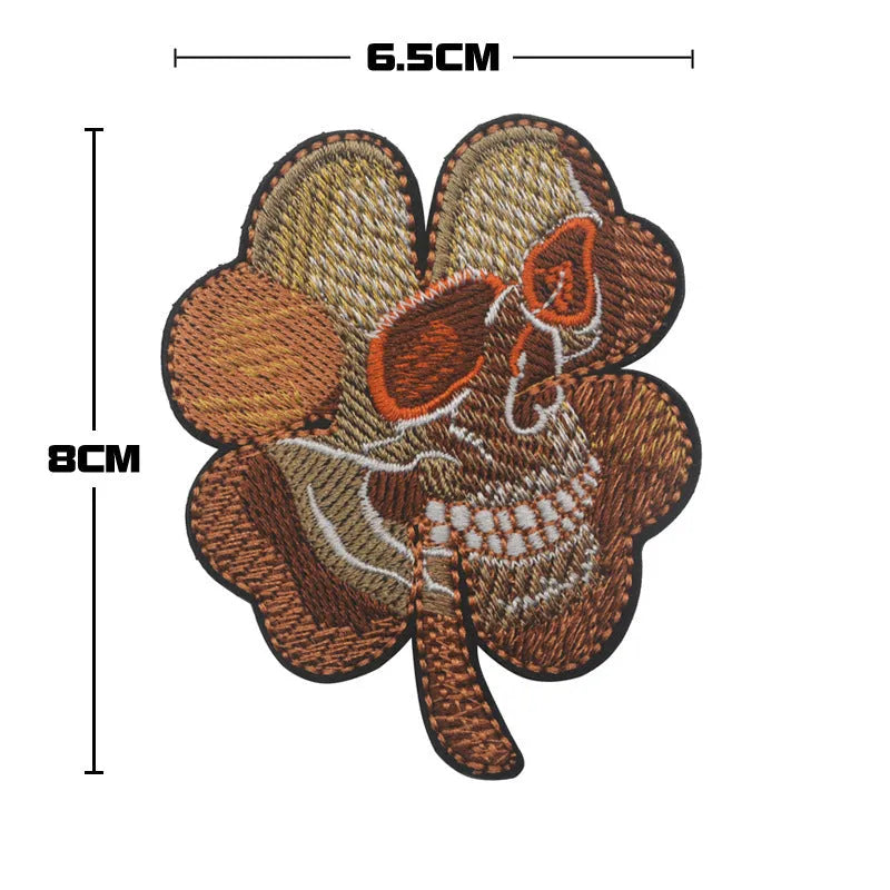 Embroidered fabric badge with Velcro strip in various colour options including green and black patterns