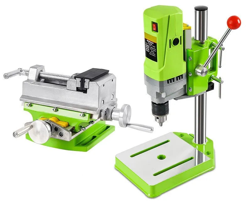 Mini bench drill and milling machine on a workbench with cross bench pliers and heavy duty pliers