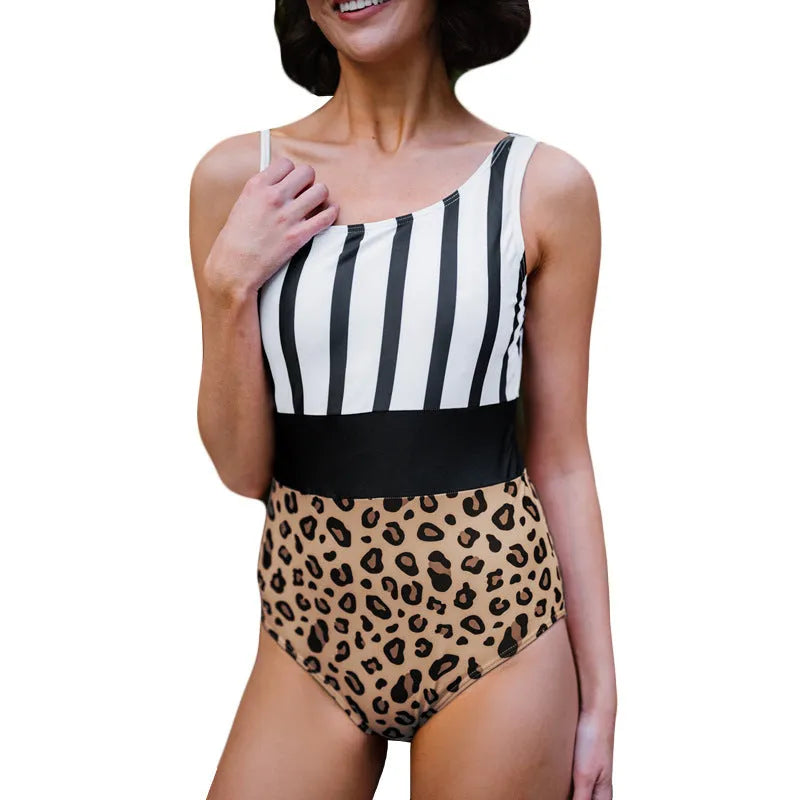 Leopard print one-piece swimsuit for women with asymmetric collar and high-waist triangle cut.