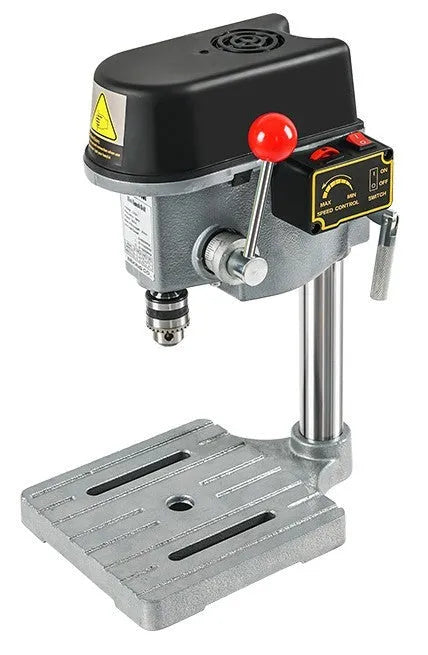 Mini bench drill and milling machine on a workbench with cross bench pliers and heavy duty pliers