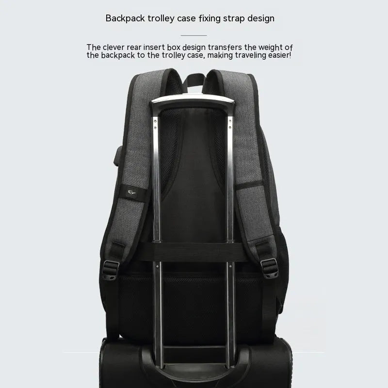 Grey and black USB charging backpack with trolley sleeve, shown with dimensions 32cm by 15cm by 46cm.