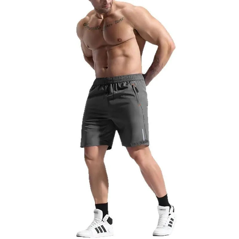 Men's grey sports shorts with an elastic high waist and drawstring, made from bamboo fibre and polyester fabric.