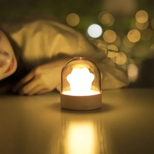 Grey or pink cat paw shaped USB rechargeable night light with music box and adjustable brightness levels