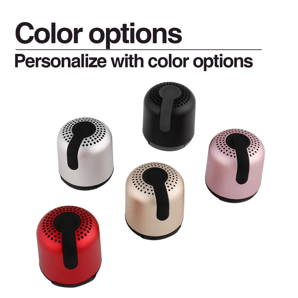 Compact cylindrical Hieha XQ11 portable Bluetooth speaker in metal casing showing colour options.