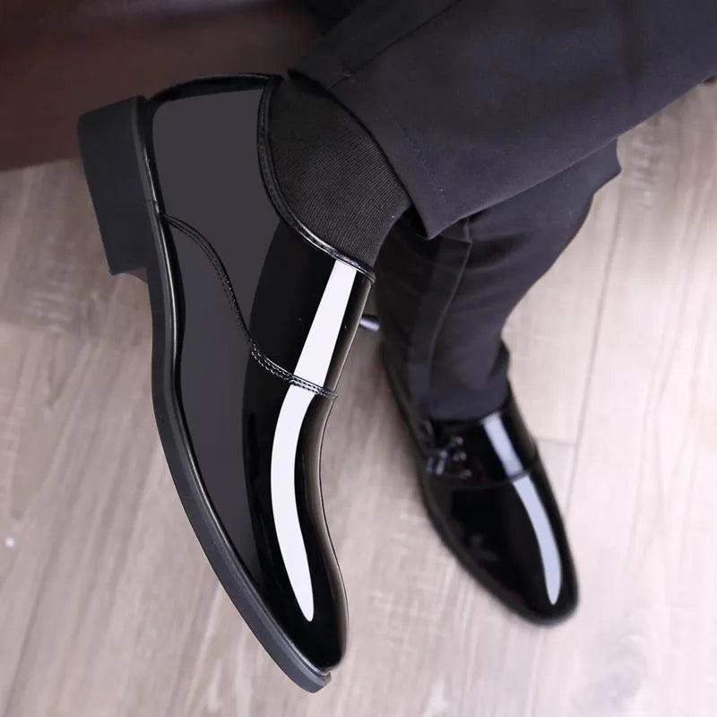 Men's black and brown formal business shoes with round toe and square heel on a rubber sole