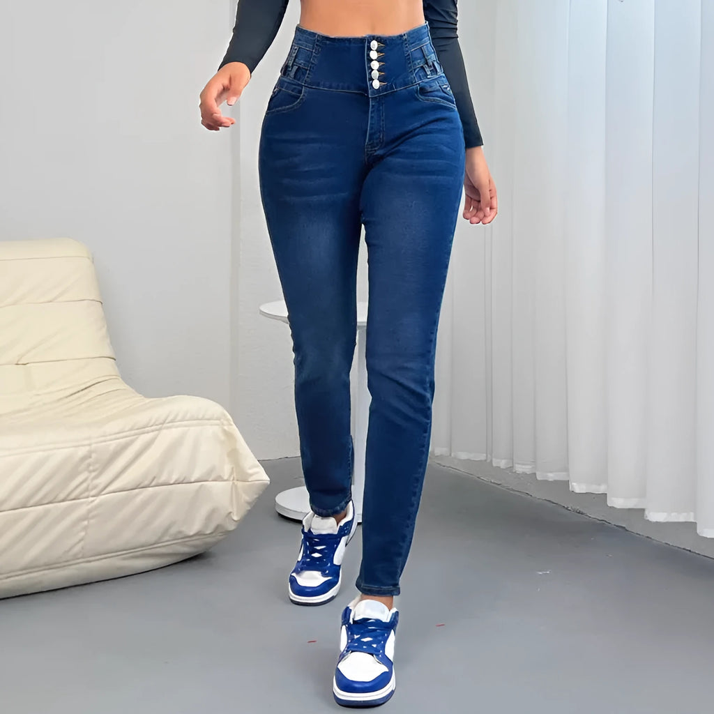 Women's dark blue straight-leg denim jeans with button and zipper closure on a white background.