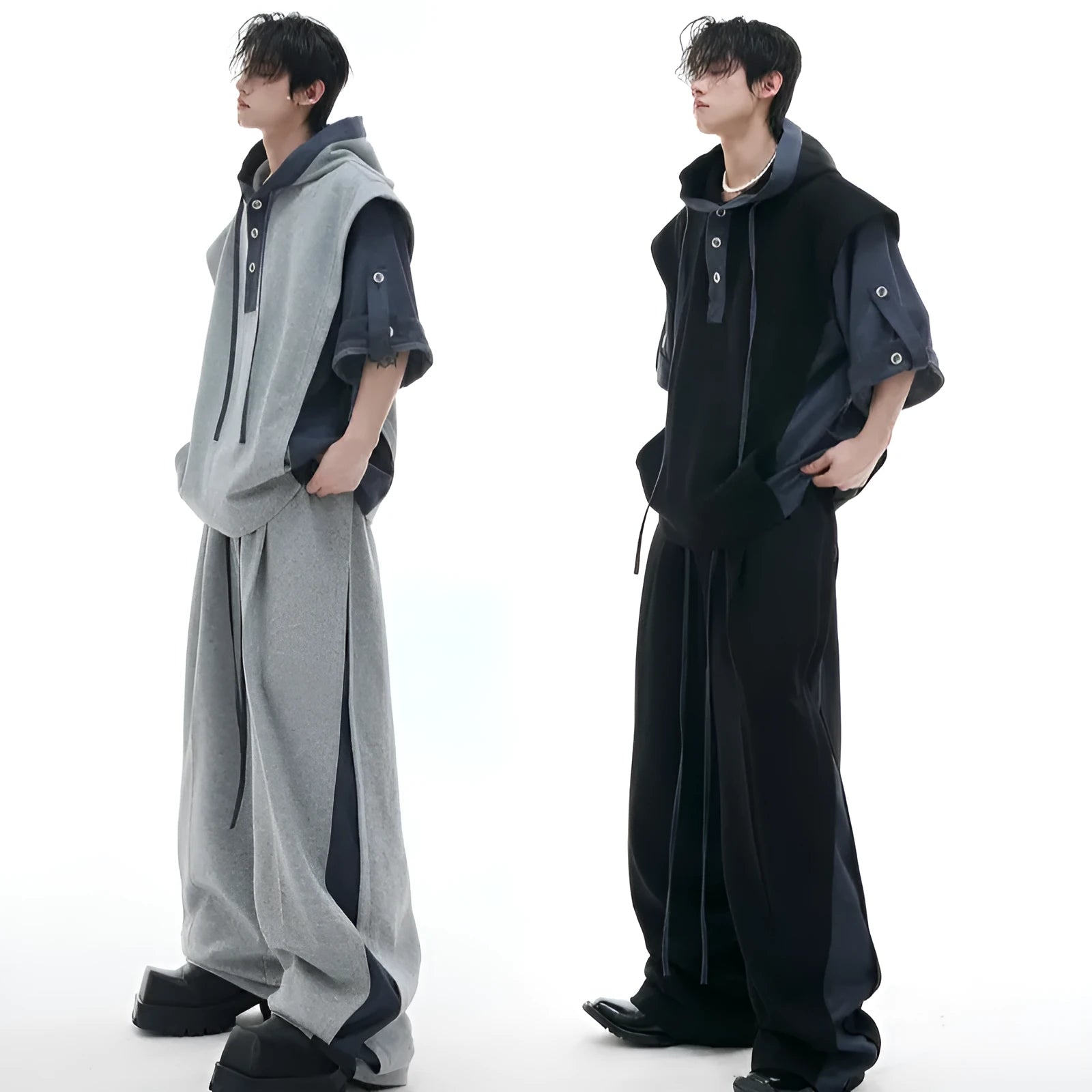 Men's black hooded short sleeve sportswear jacket and trousers set with three-dimensional stitching detail.