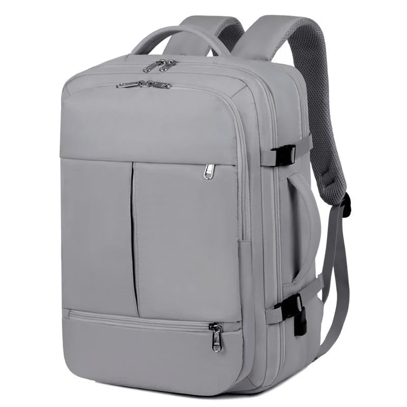 Waterproof Oxford cloth backpack with multiple pockets, shown in black colour, displaying laptop compartment and zippered organisers.