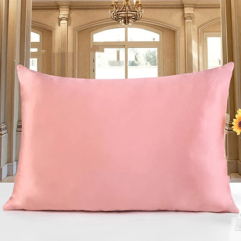19 M double-sided silk pillowcase in apricot colour, showing envelope closure and smooth fabric texture.