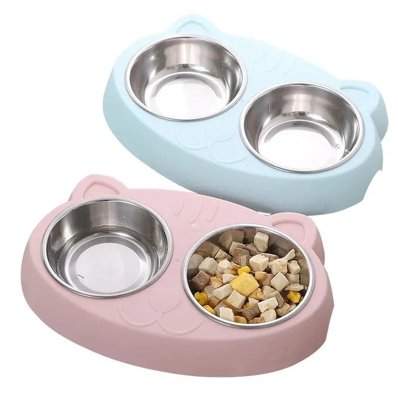 Blue macaron-shaped plastic pet feeding tray with two bowls and non-slip rubber feet