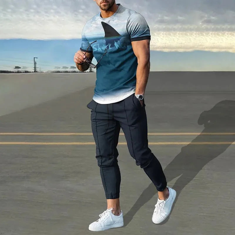 Men's short sleeve printed T-shirt and matching trousers sport suit set on a hanger.
