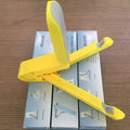 Black foldable tablet holder showing adjustable angle stand with phone positioned in landscape orientation
