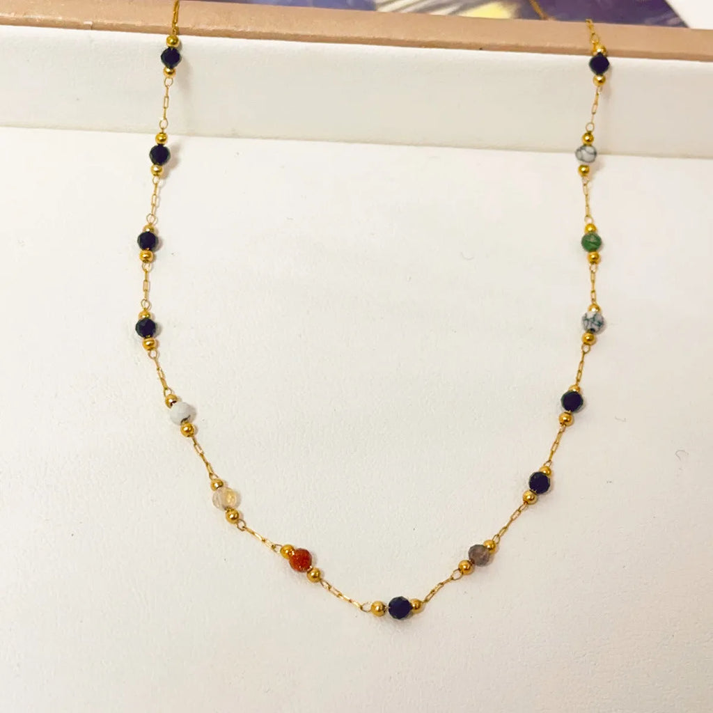 Gold electroplated titanium steel necklace with natural stone pendant on O-ring chain for women