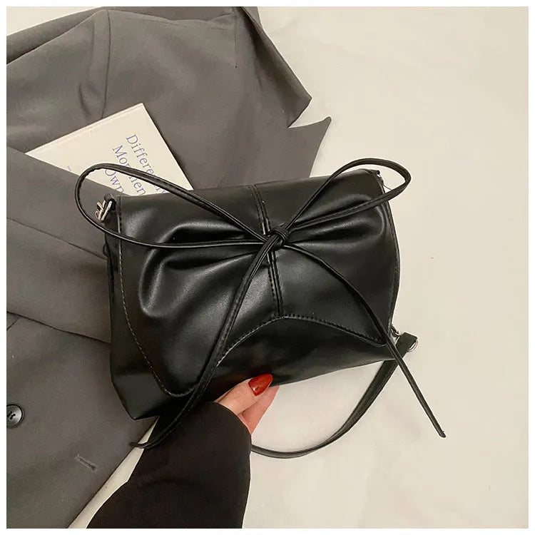 Women's black PU leather underarm crossbody bag with large capacity horizontal square shape and sewing line detailing