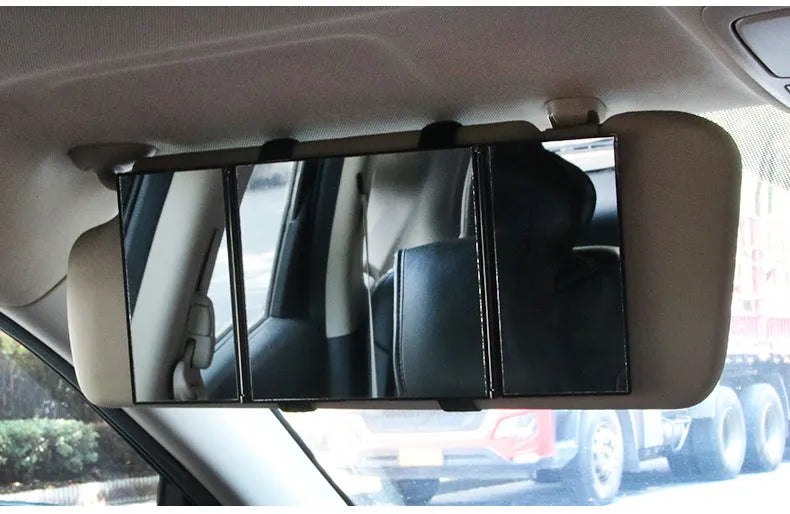 Silver car folding makeup mirror shown both closed and open positions