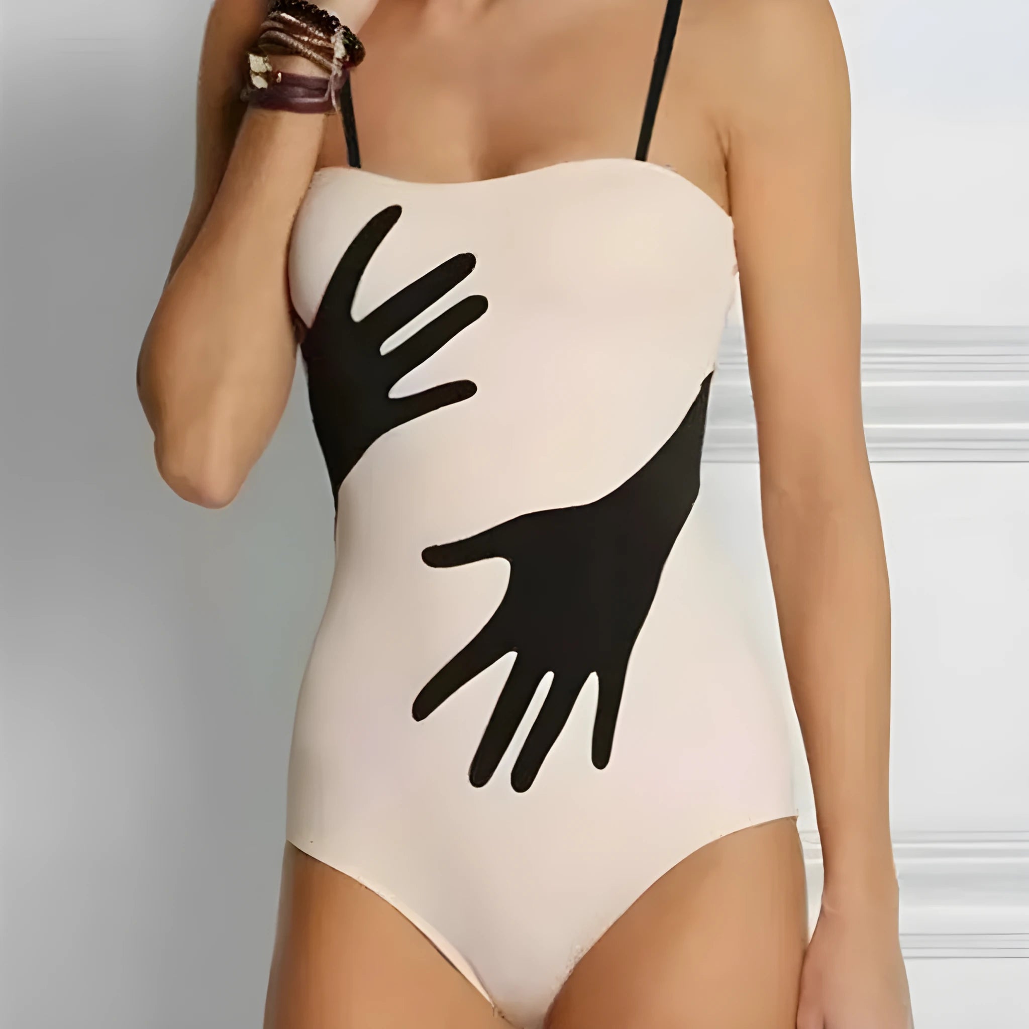 Women's one-piece bikini swimsuit with gauze skirt detail in polyester fabric.
