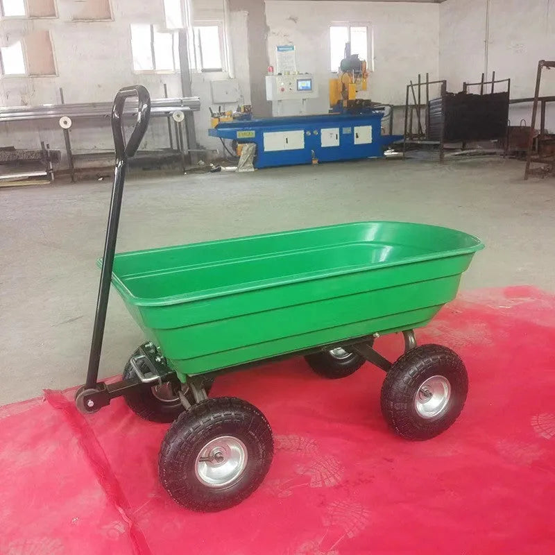 Green four-wheel steel and plastic dumptruck with a large hauling bed.