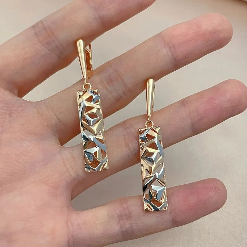 Rectangular hollow two-tone stud earrings with geometric pattern