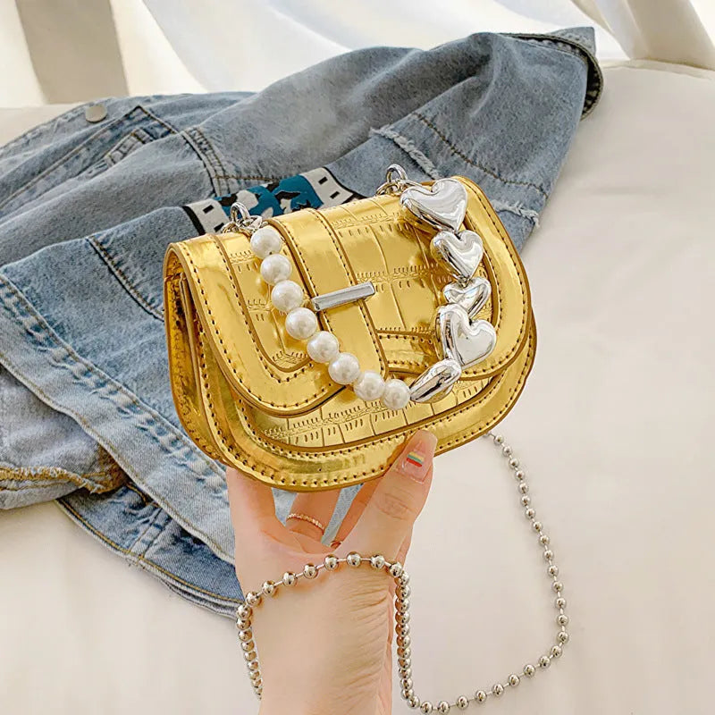 Women's silver mini tote saddle crossbody bag with mobile phone pocket and synthetic leather lining