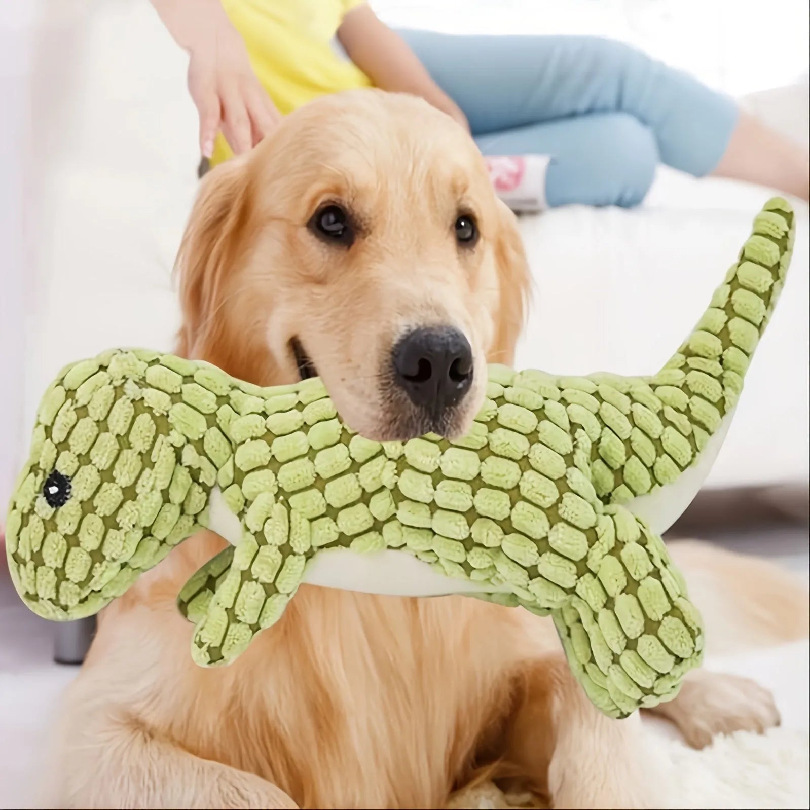 Interactive dog toy with sound features for bite-resistant chewing, available in grey, green, or orange colours.