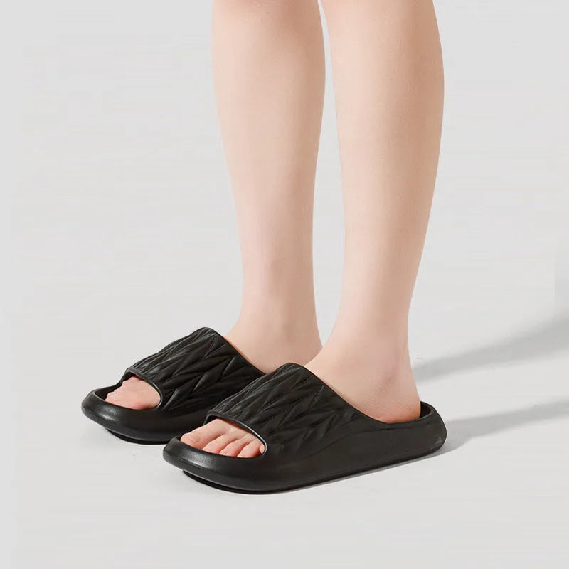 Leaf texture design EVA slippers for indoor summer wear, shown in assorted colours.