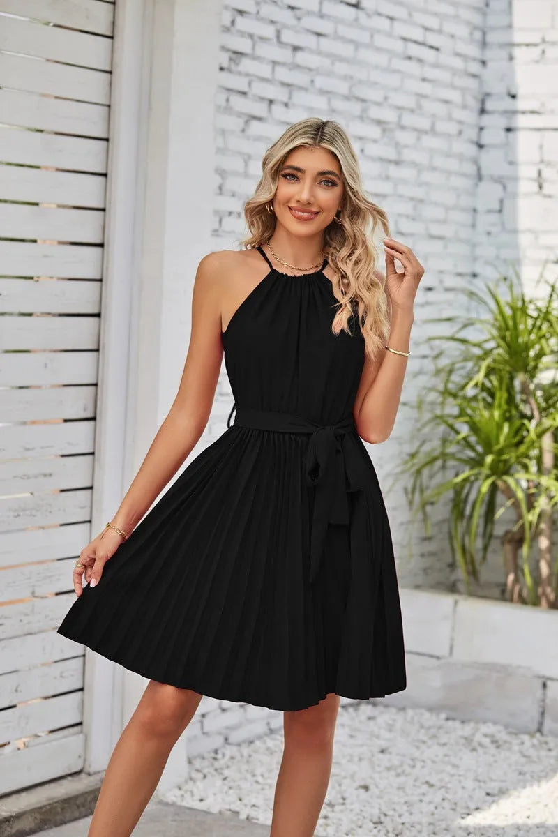Women's black chiffon halter sundress with pleated midi skirt and adjustable waist belt.