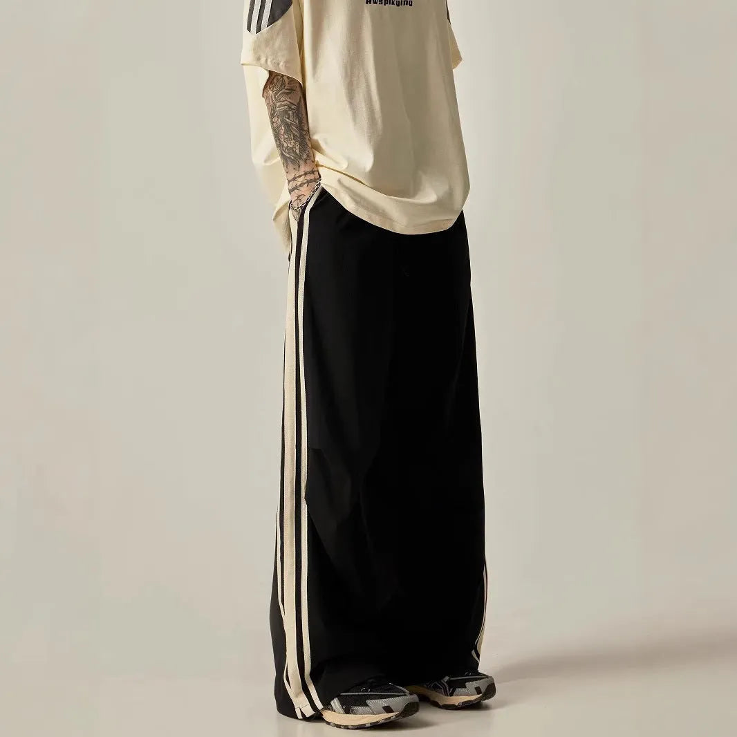 Men's black wide leg climbing trousers with high waist and straight leg design
