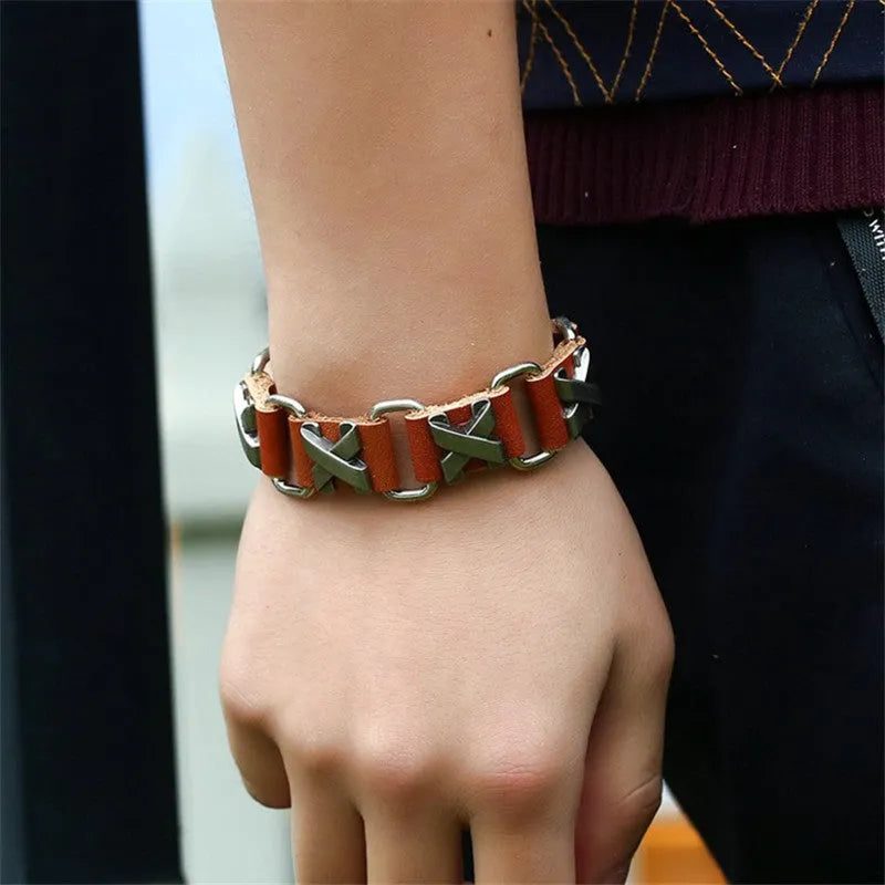 Black retro handmade leather bracelet with letter connection on a neutral background