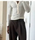Men's cream-coloured ribbed long-sleeve henley top with a four-button placket