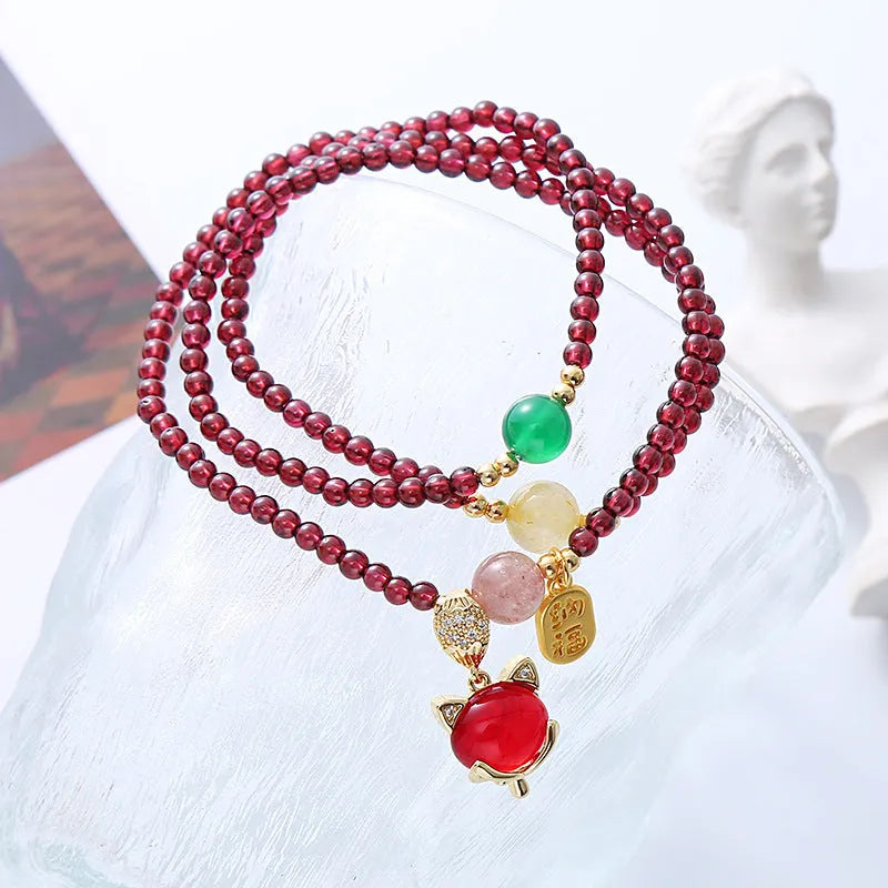 Purplish red garnet fox charm bracelet with adjustable rope for women