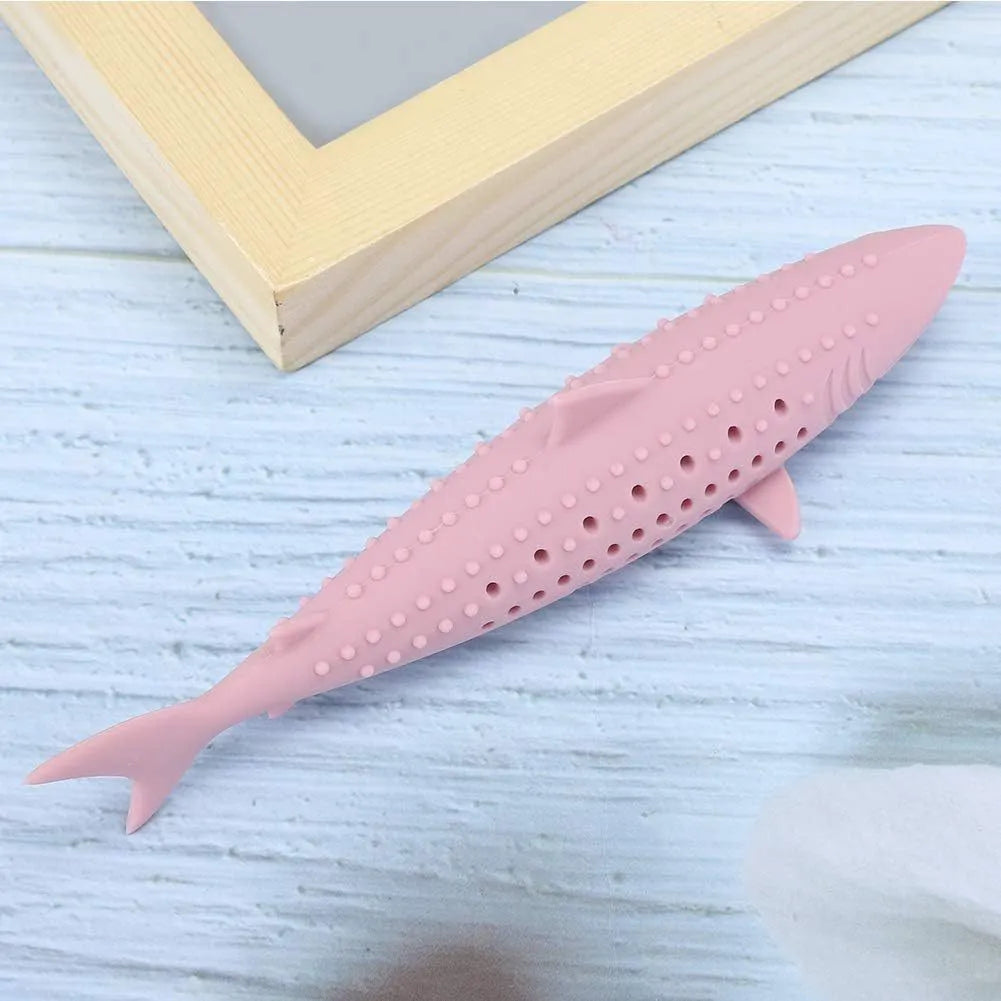 Green silicone fish-shaped cat chew toy with removable design showing breathable side holes