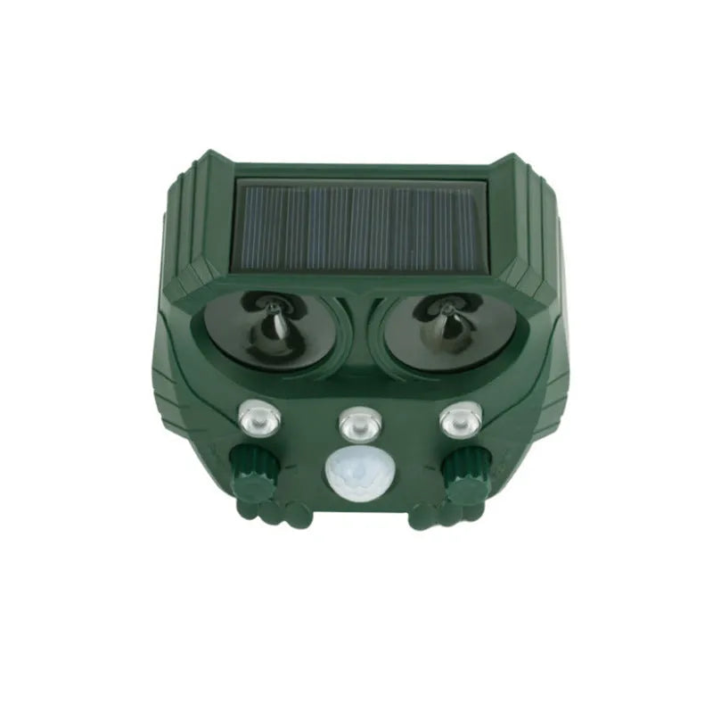Green solar-powered ultrasonic animal repeller unit for outdoor pest control.