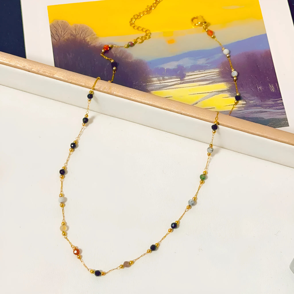 Gold electroplated titanium steel necklace with natural stone pendant on O-ring chain for women