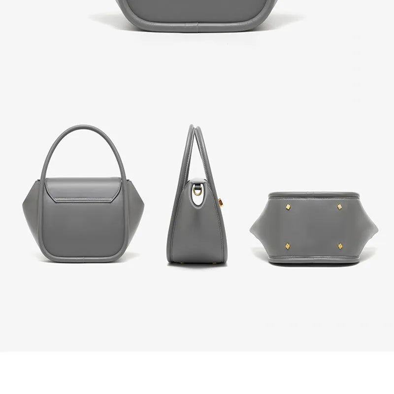 Wing-shaped women's leather handbag with latch closure and cross-body strap in available colours.