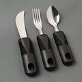 Anti-shake adaptive tableware set with stainless steel utensils and rubber handle grips